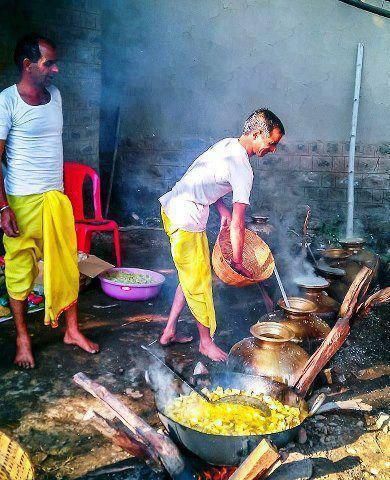Traditional Kangri Dham food being prepared by Himachali cooks in large pots