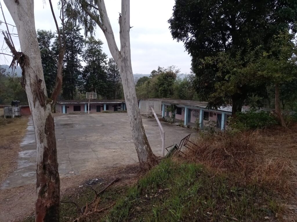 Outdoor basketball court with trees